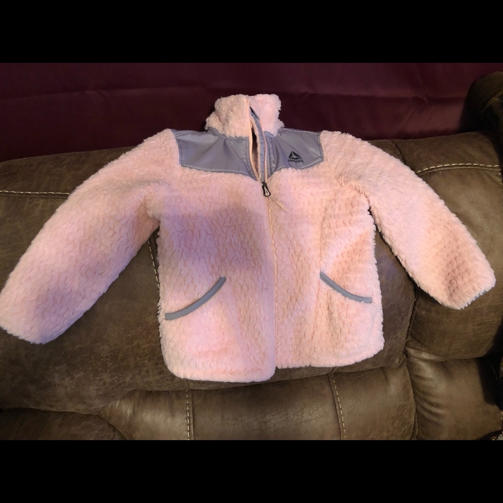 Girls 5/6 Reebok fuzzy light pink jacket.